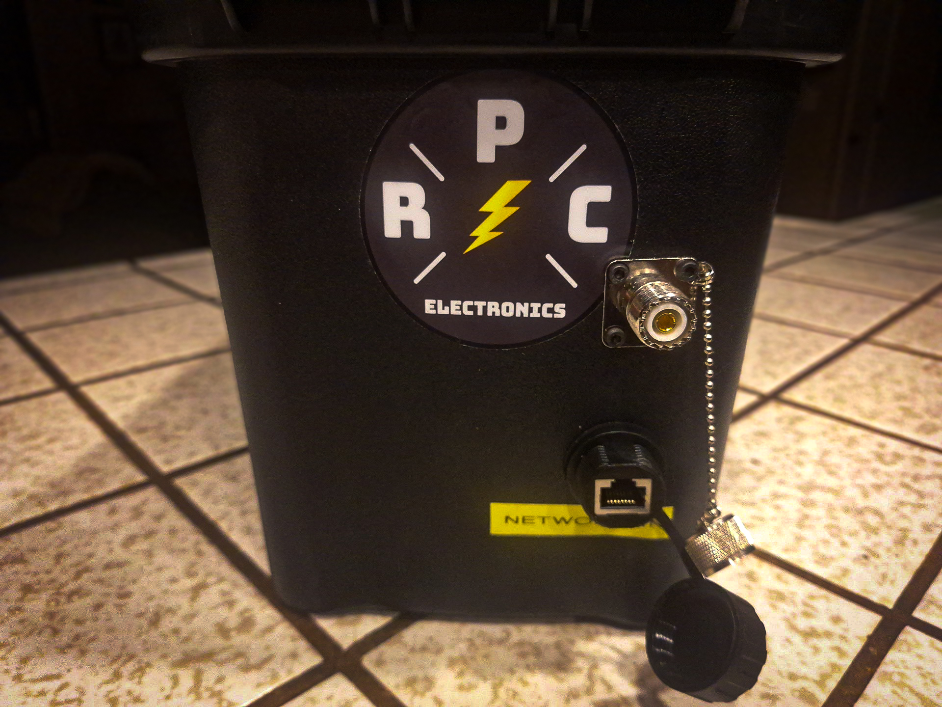 Front face of the Utility Box with a panel mount SO239 and ethernet port installed.