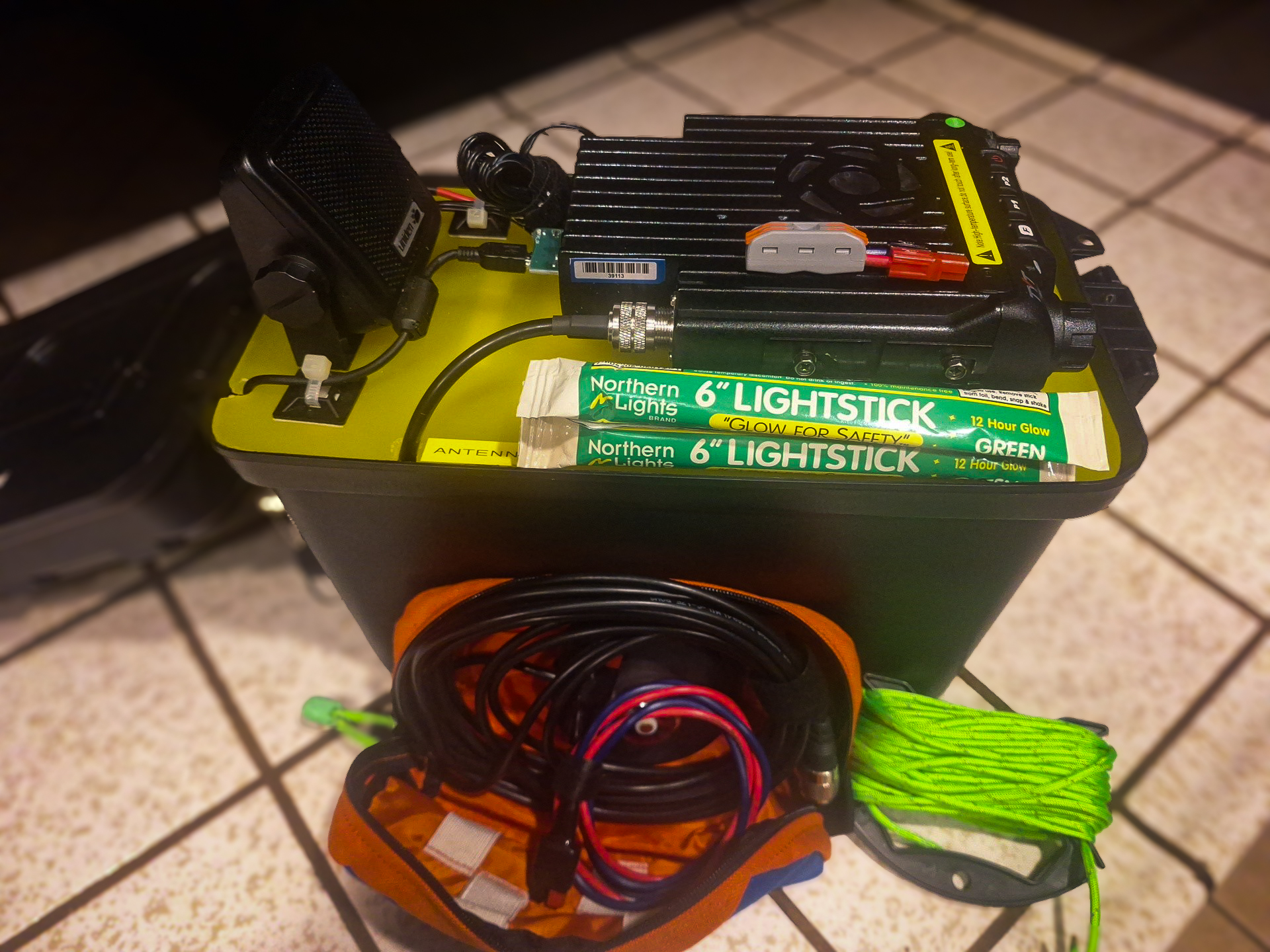 Tactical winlink gateway with accessory bag and sample accessories including mag mount antenna, working line, glow sticks, etc.